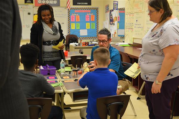 students and teachers in classroom