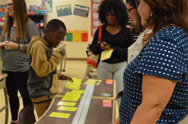 students and teachers in classroom