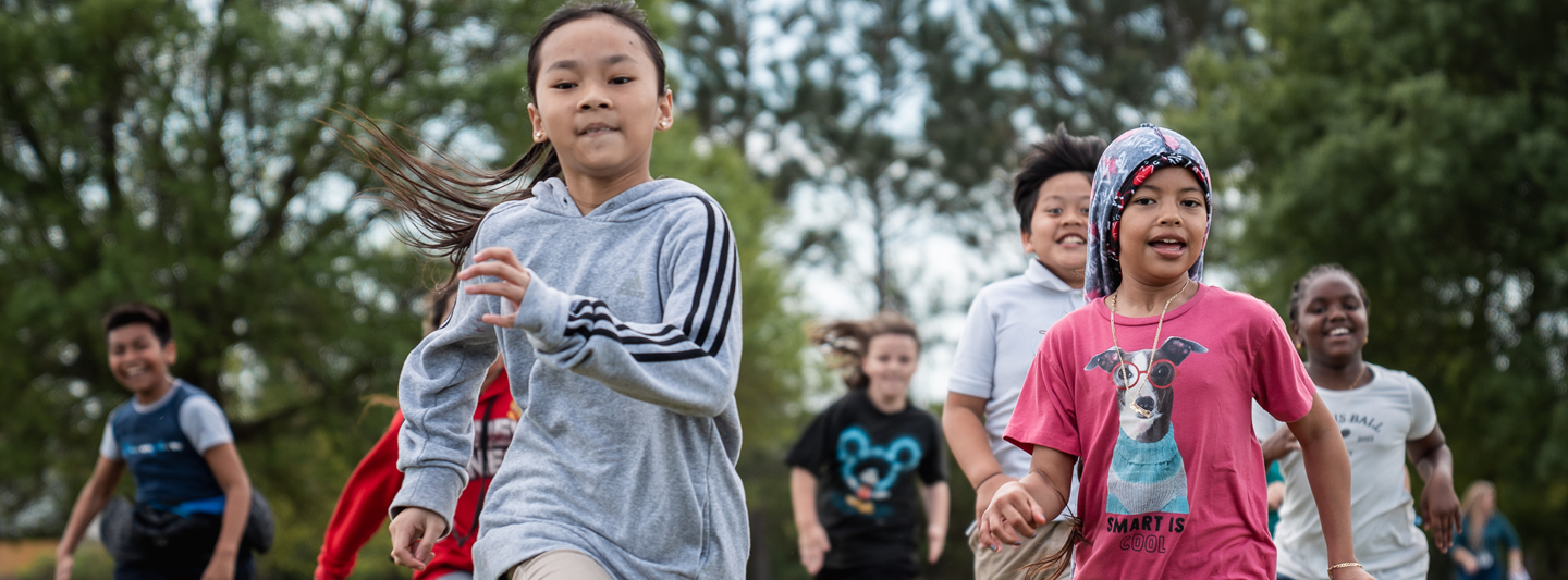 students running on a field