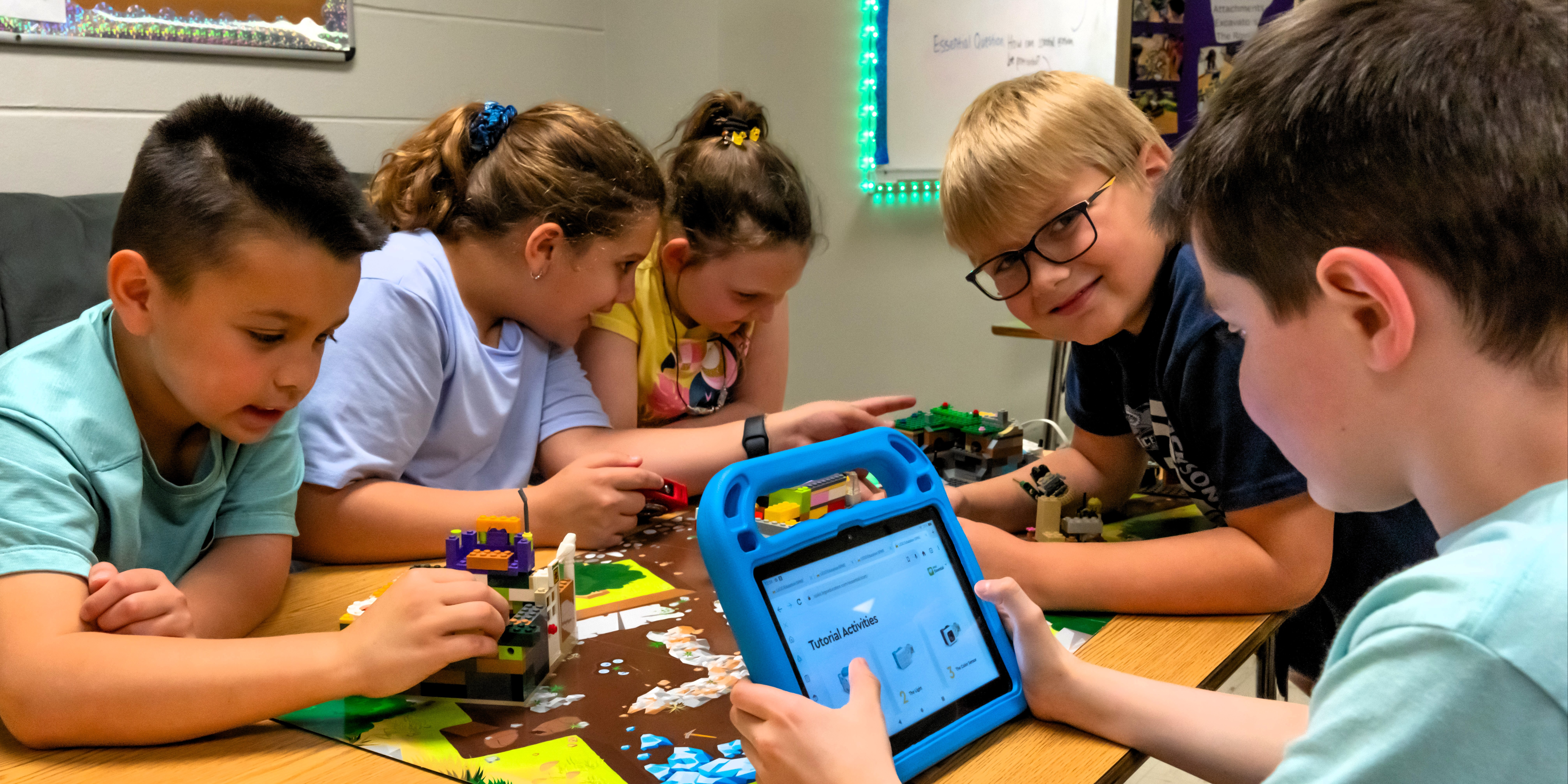 students working on programming, coding, and LEGO robotics