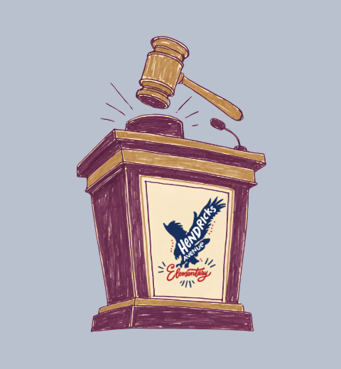 A podium with a wooden gavel on top and a blue bird on a sign. The background is plain gray.