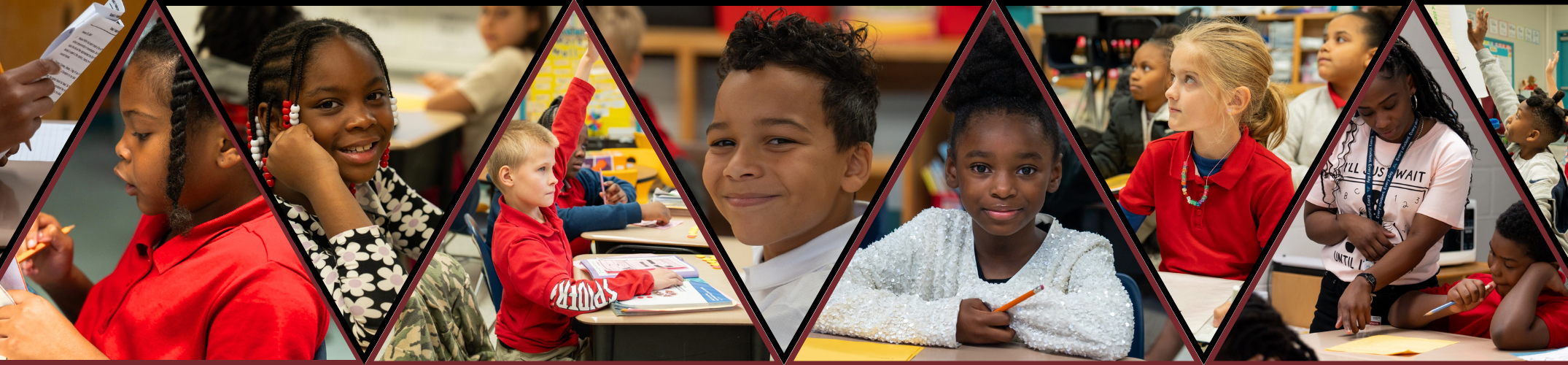 A classroom with students engaged in learning activities; some seated at desks while others stand and participate.