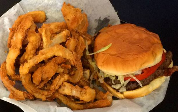 burger and fried onion rings