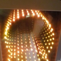 yelllow lights reflected in mirror