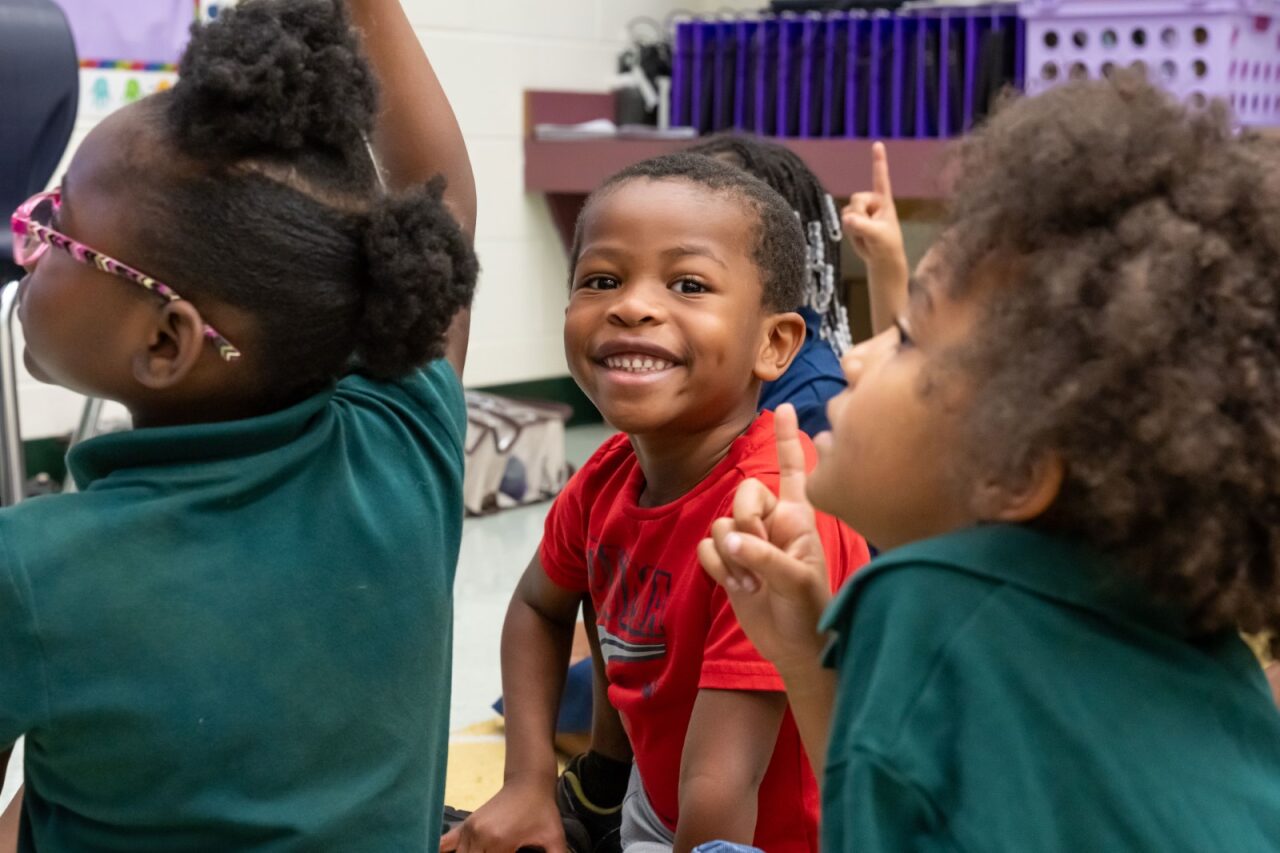 Student smiling at the camera