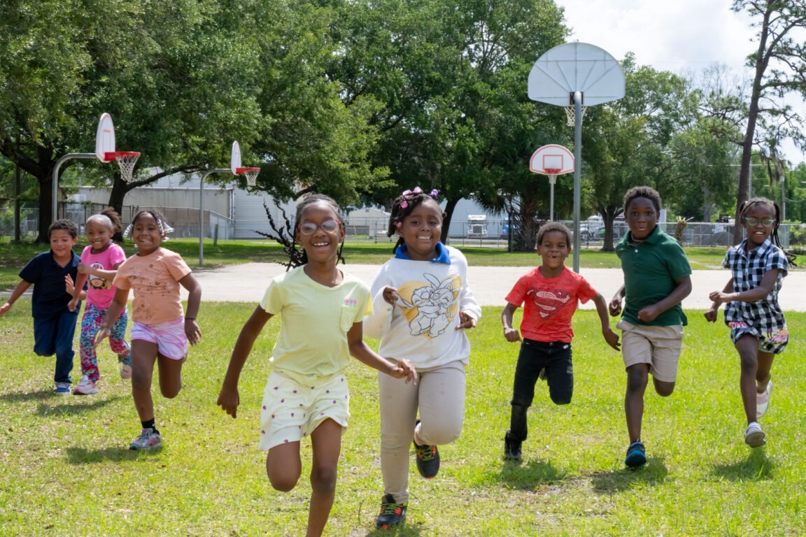 Students running on the playgound