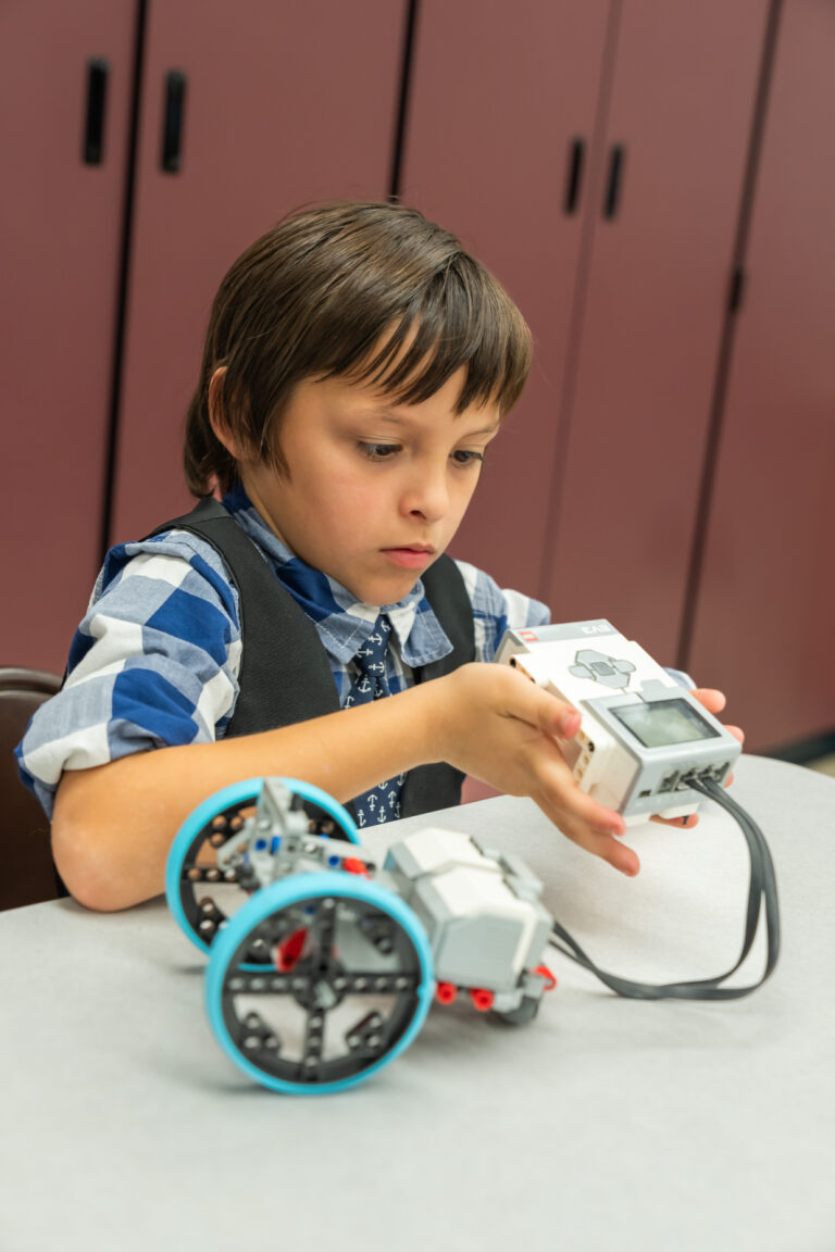 Student working on a robot