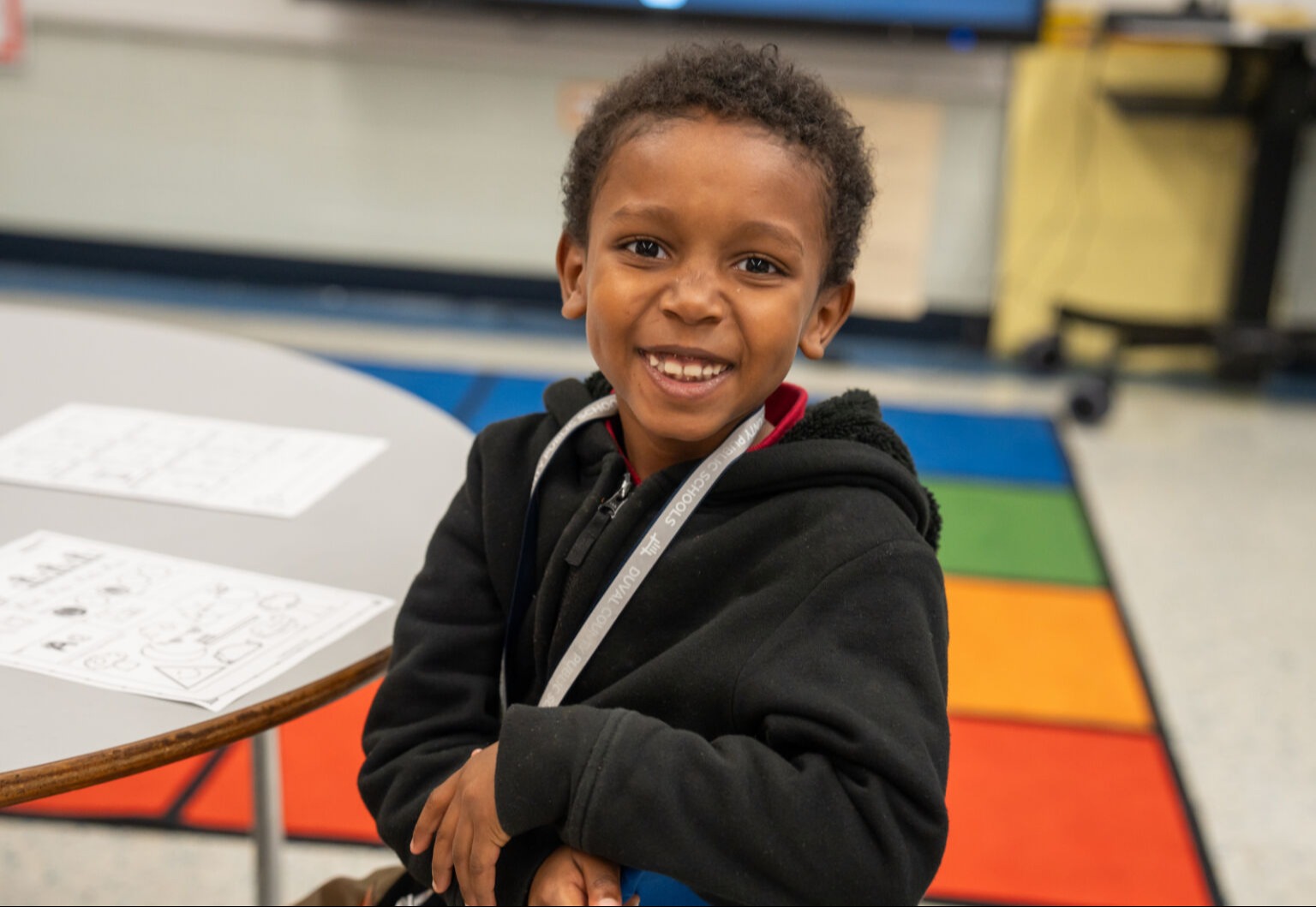 Student smiling at the camera