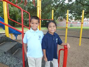 Students show their school spirit by wearing their uniforms to school.