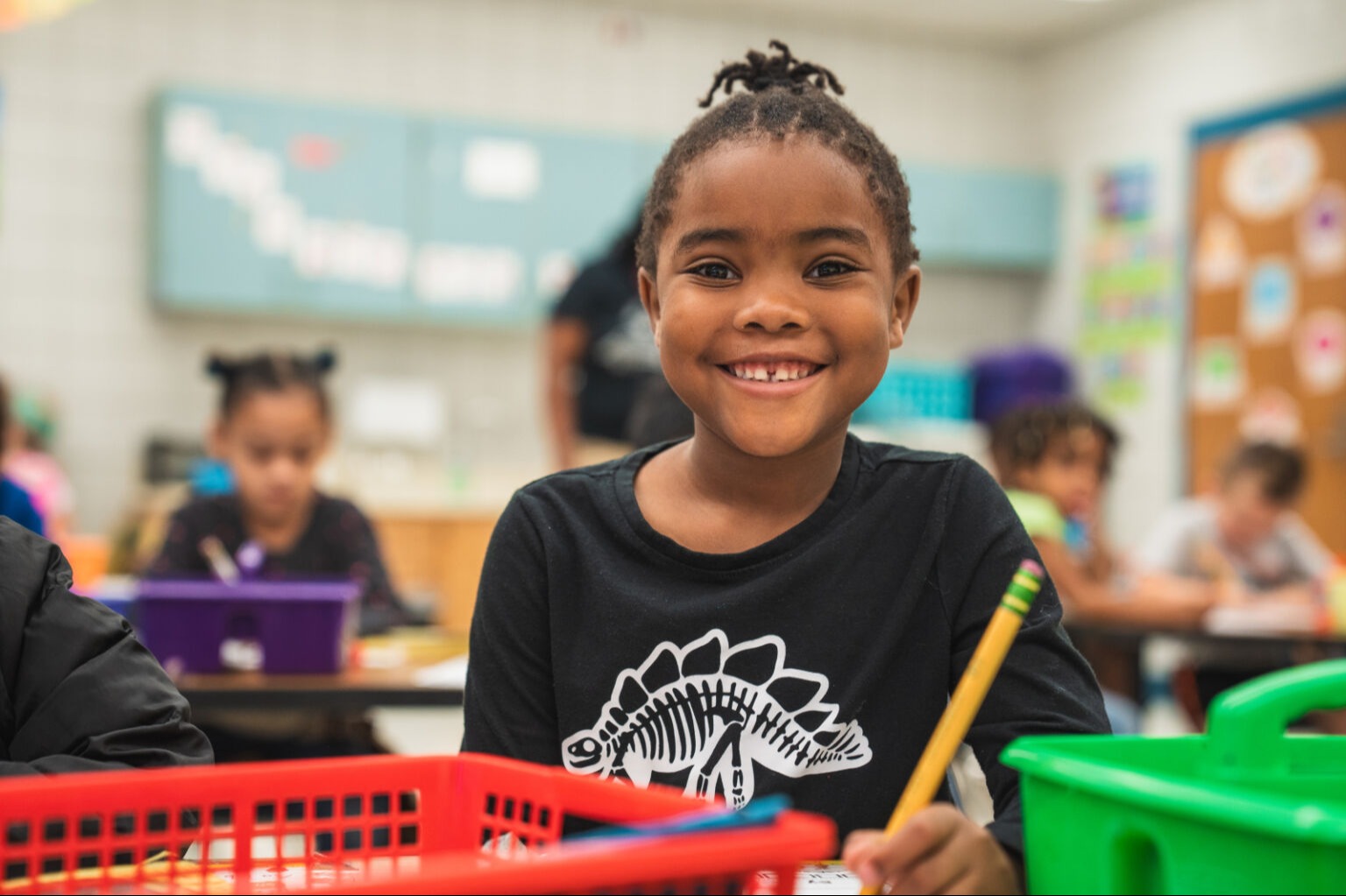 Student smiling at the camera