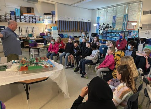 teacher and students in the classroom