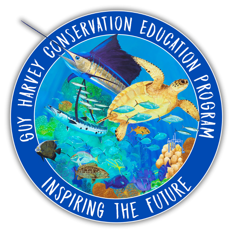 Circular logo with marine life. A turtle and fish in the center, surrounded by coral reefs. Words: Guy Harvey Conservation Education Program, Inspiring the Future.