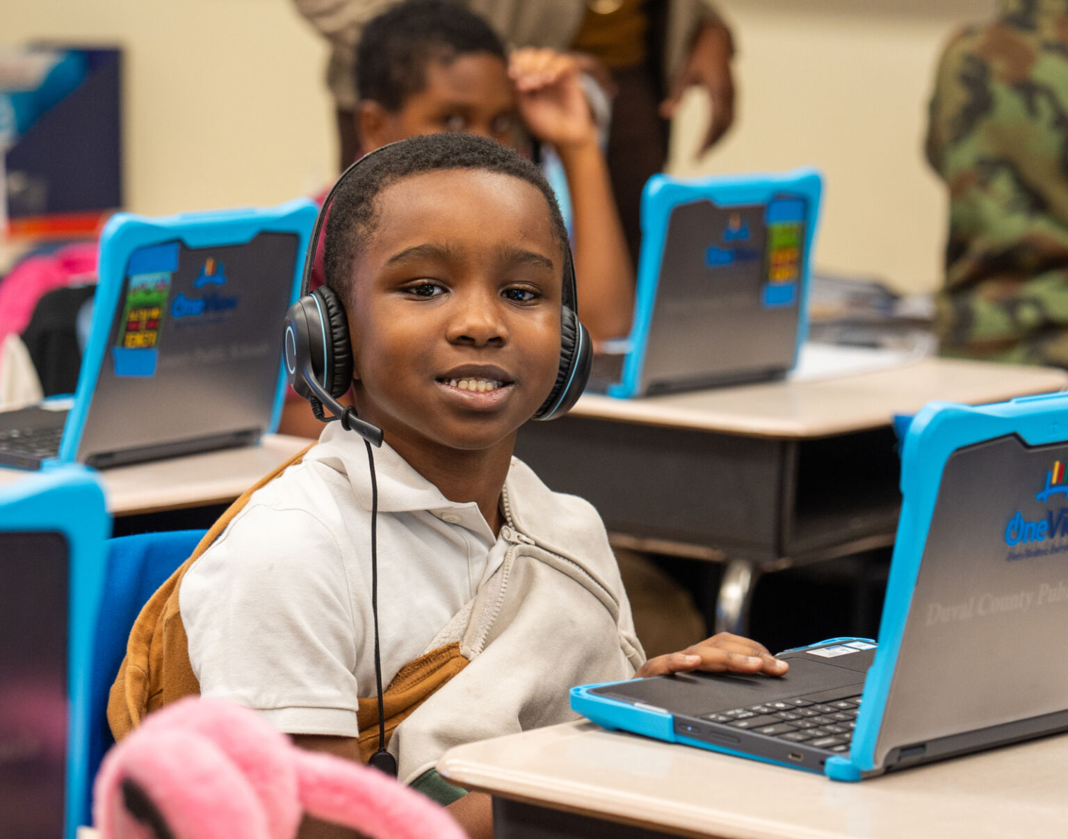 Student smiling at the camera