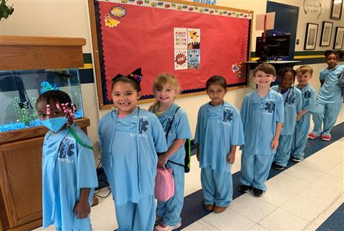 students lining up and smiling