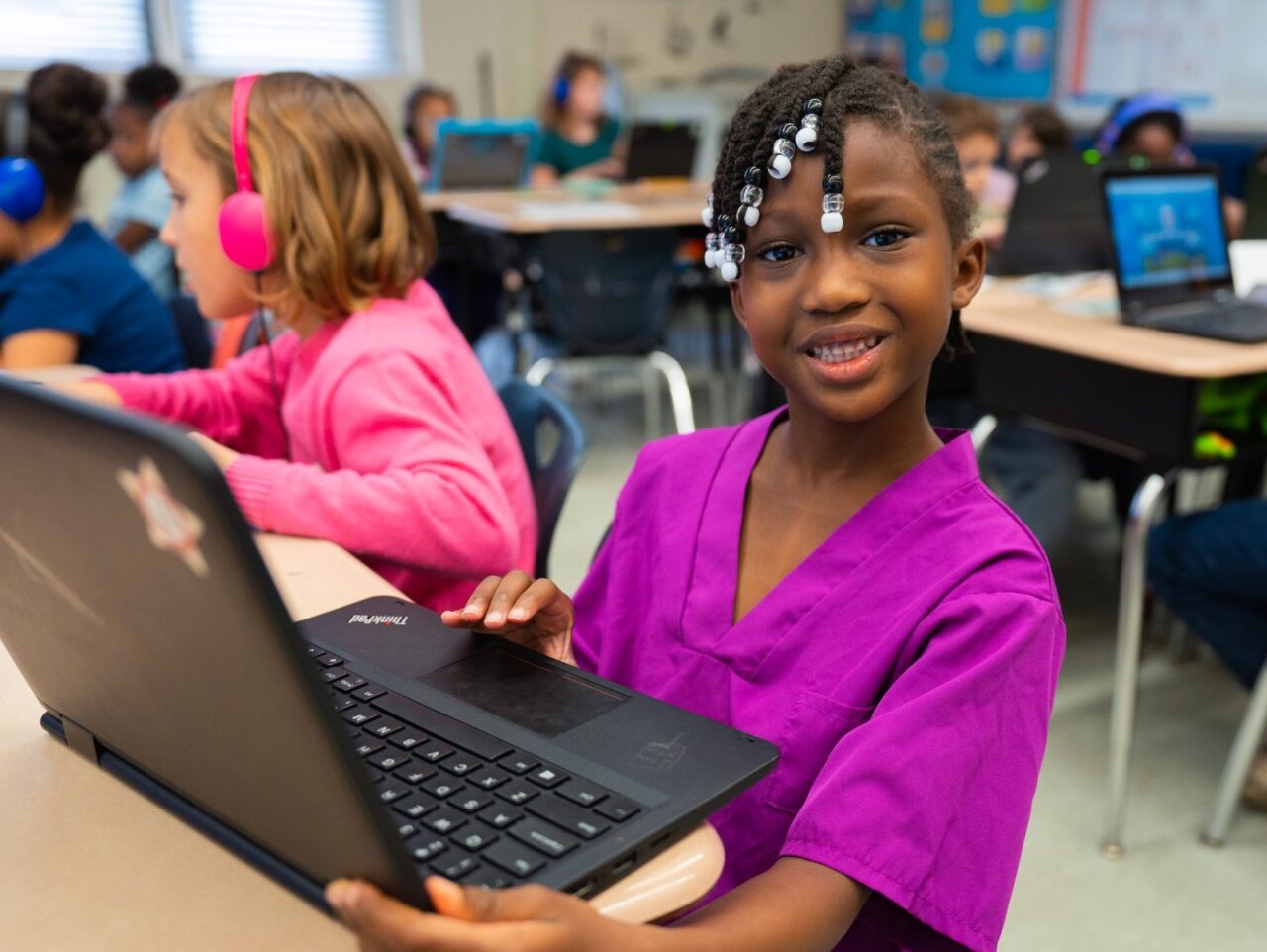 Student smiling in the camera
