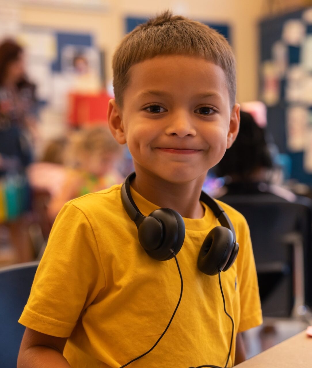 Student smiling at the camera