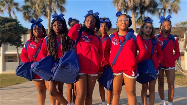 cheerleading squad smiling