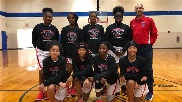 women basketball team smiling