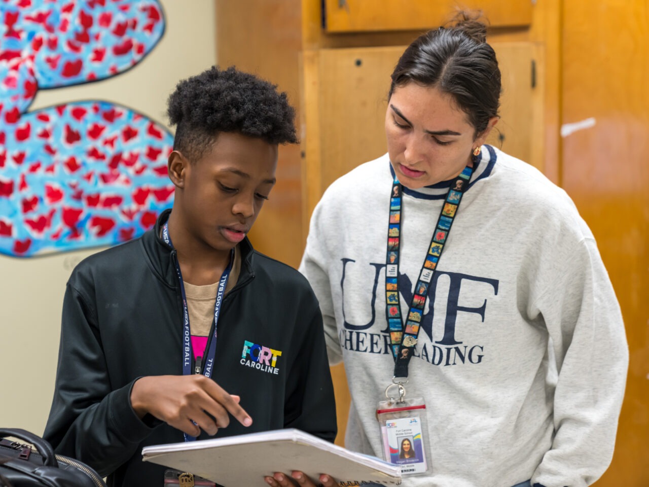 Teacher helping a student