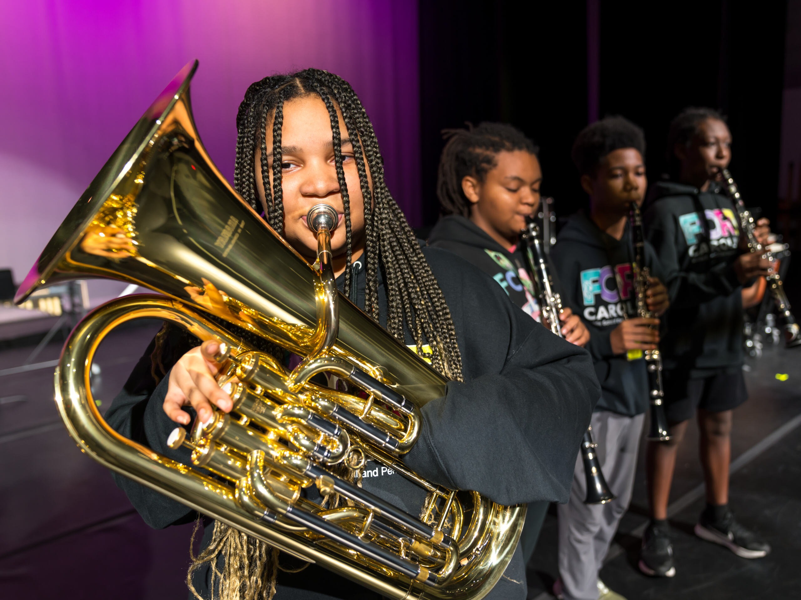 A student playing an instrument 