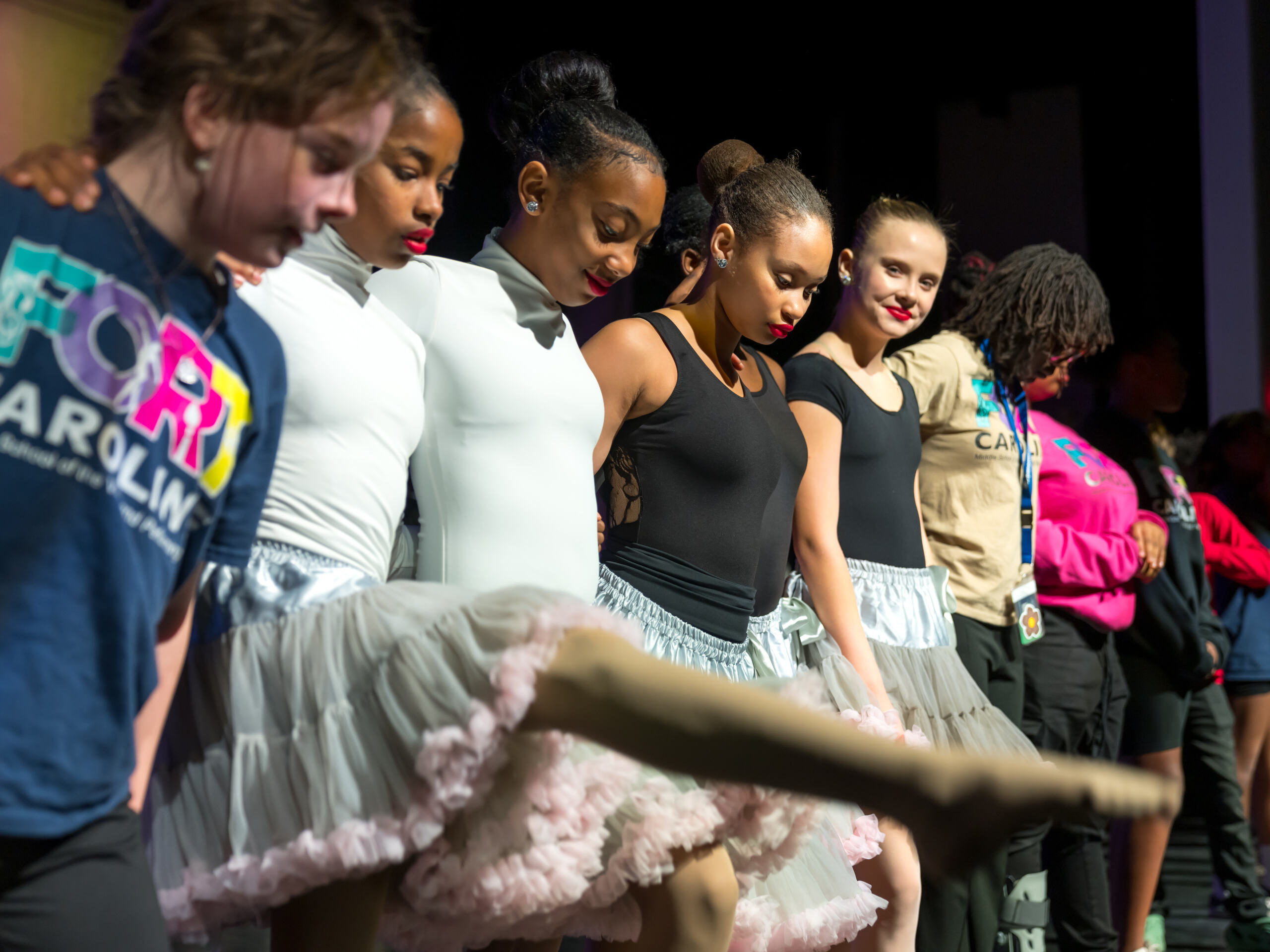 Students on stage performing