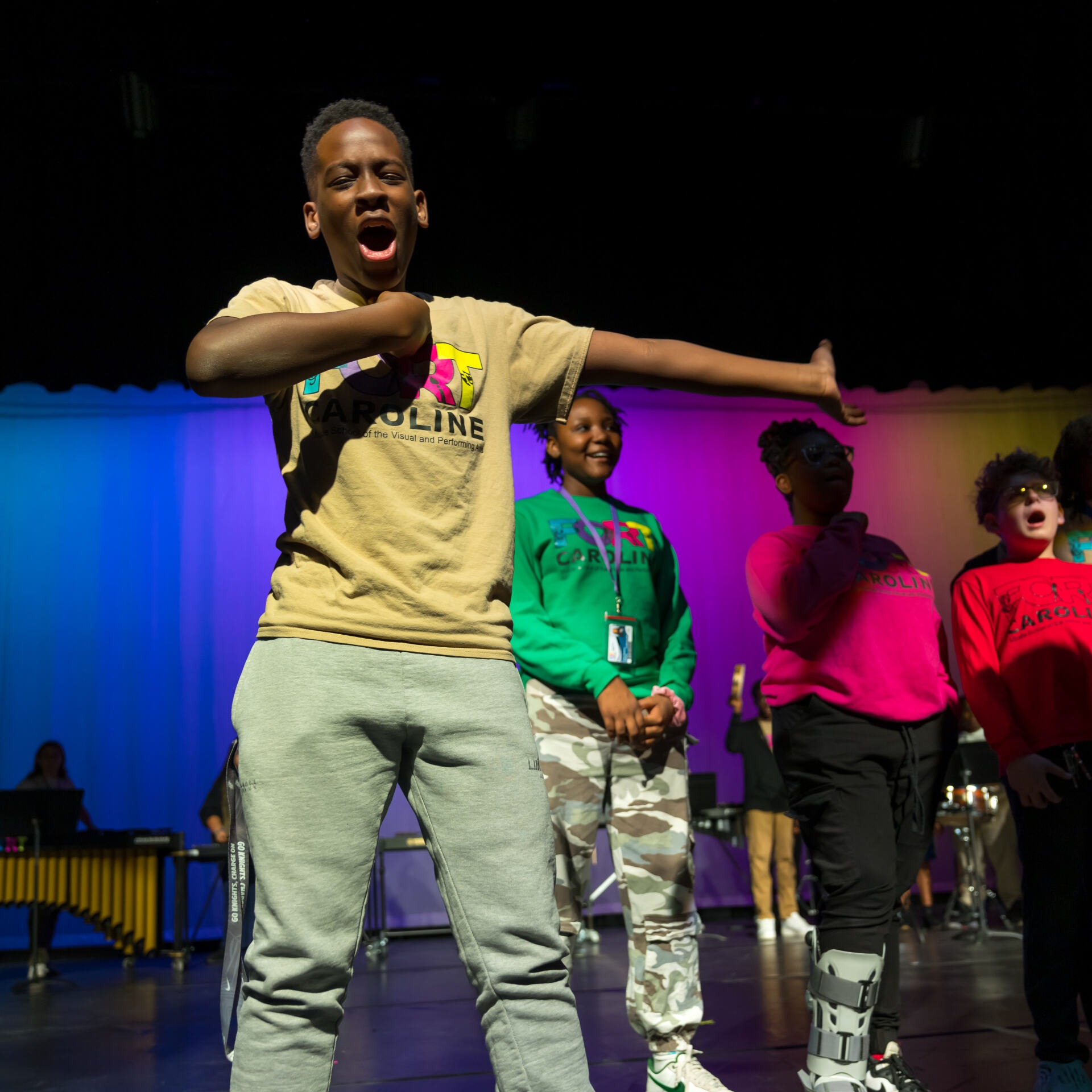 Student performing on stage