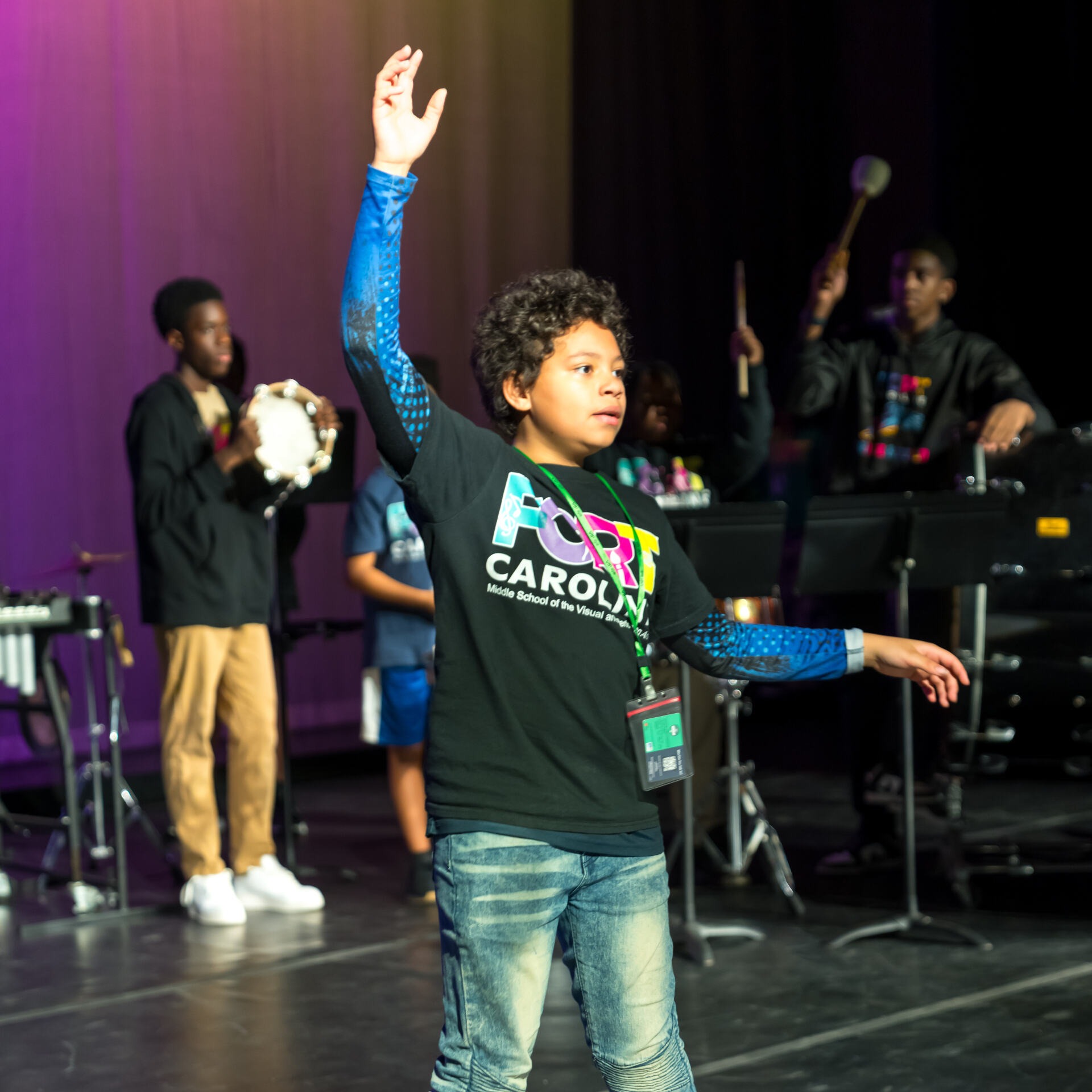A student performing on stage