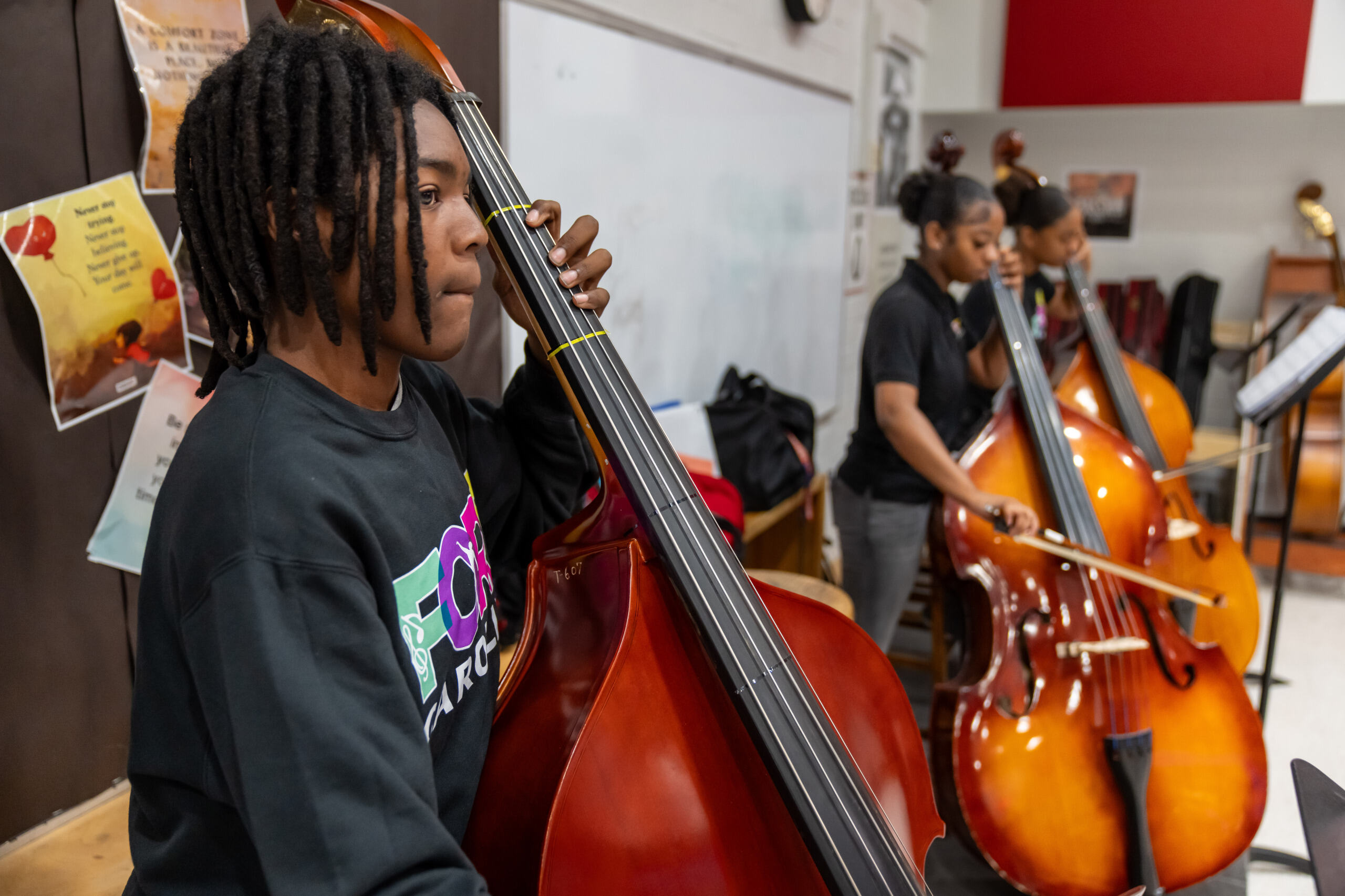 Student playing bass