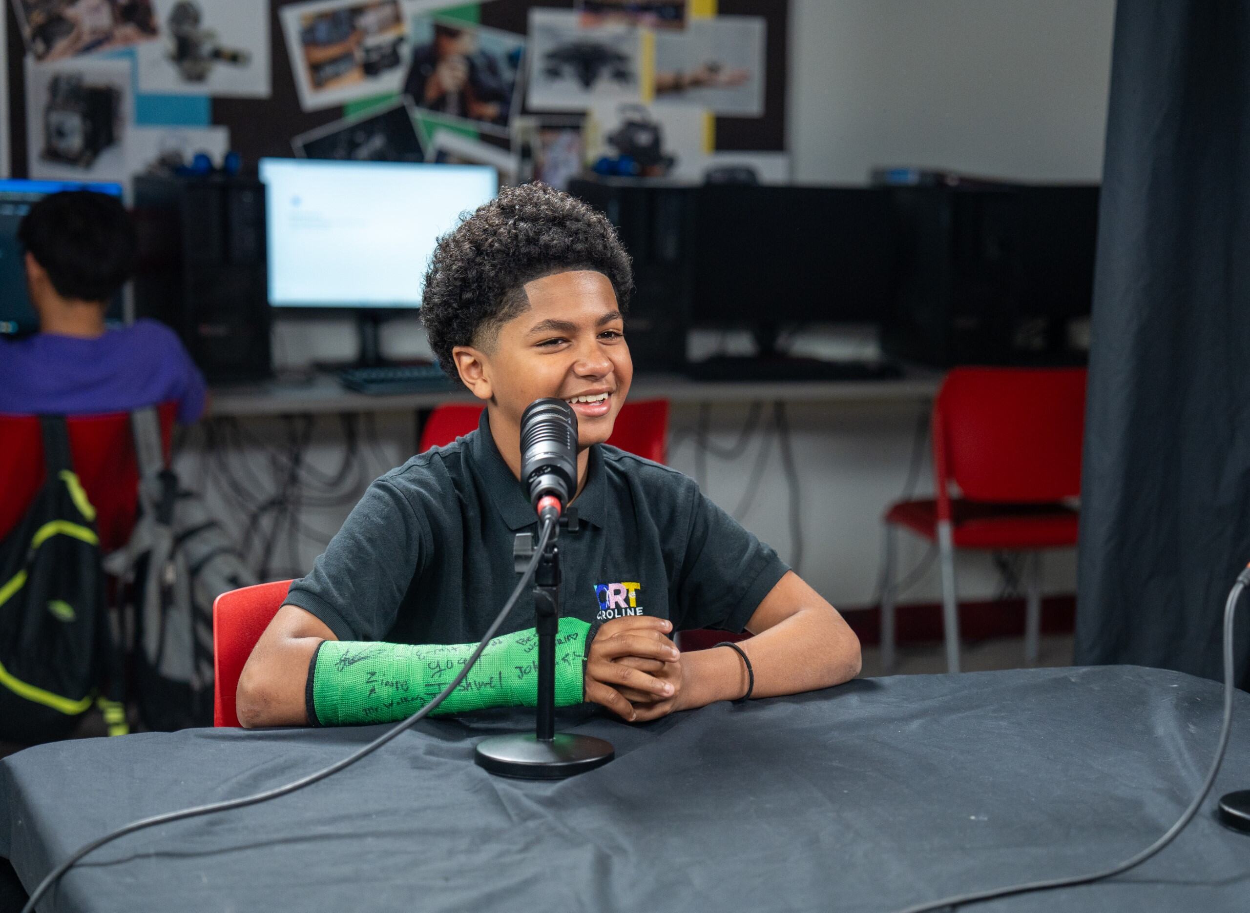 A student speaking in a podcast