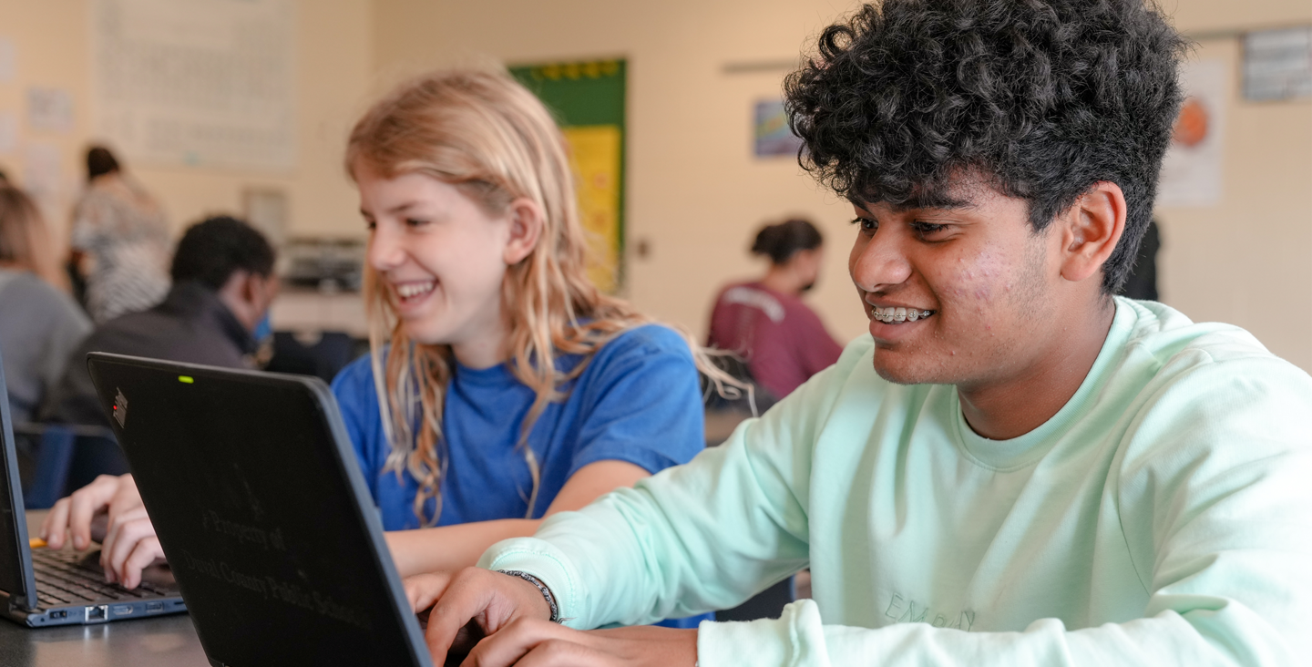 students working on their laptops