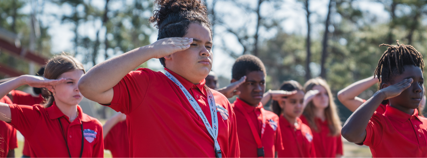 Kids practicing their salute