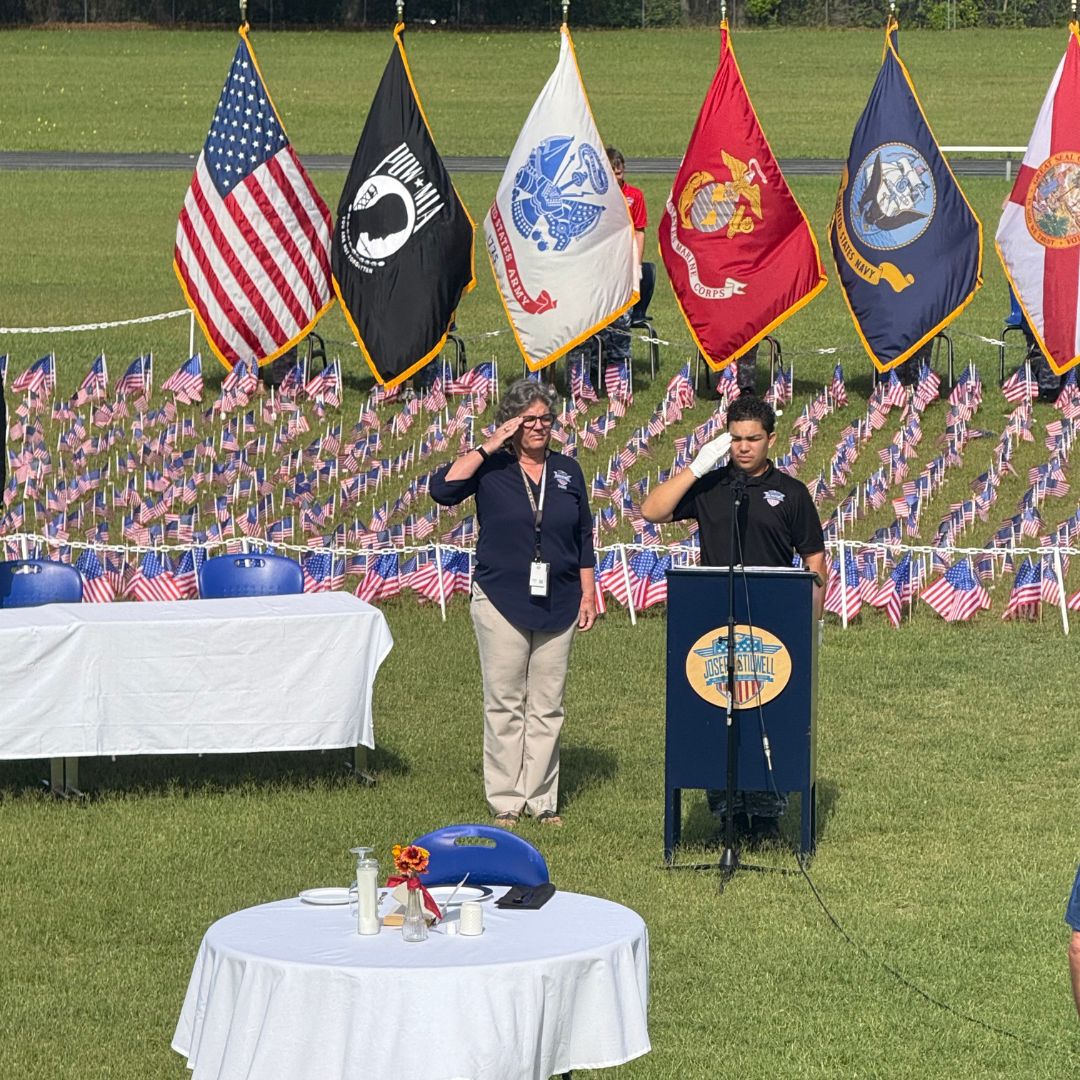 Cadet Torres-Alvarez during the Memorial Day Ceremony with Principal Roper.