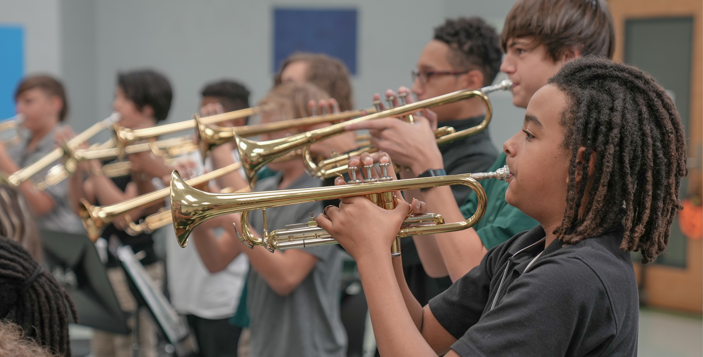 Kids playing trumpets