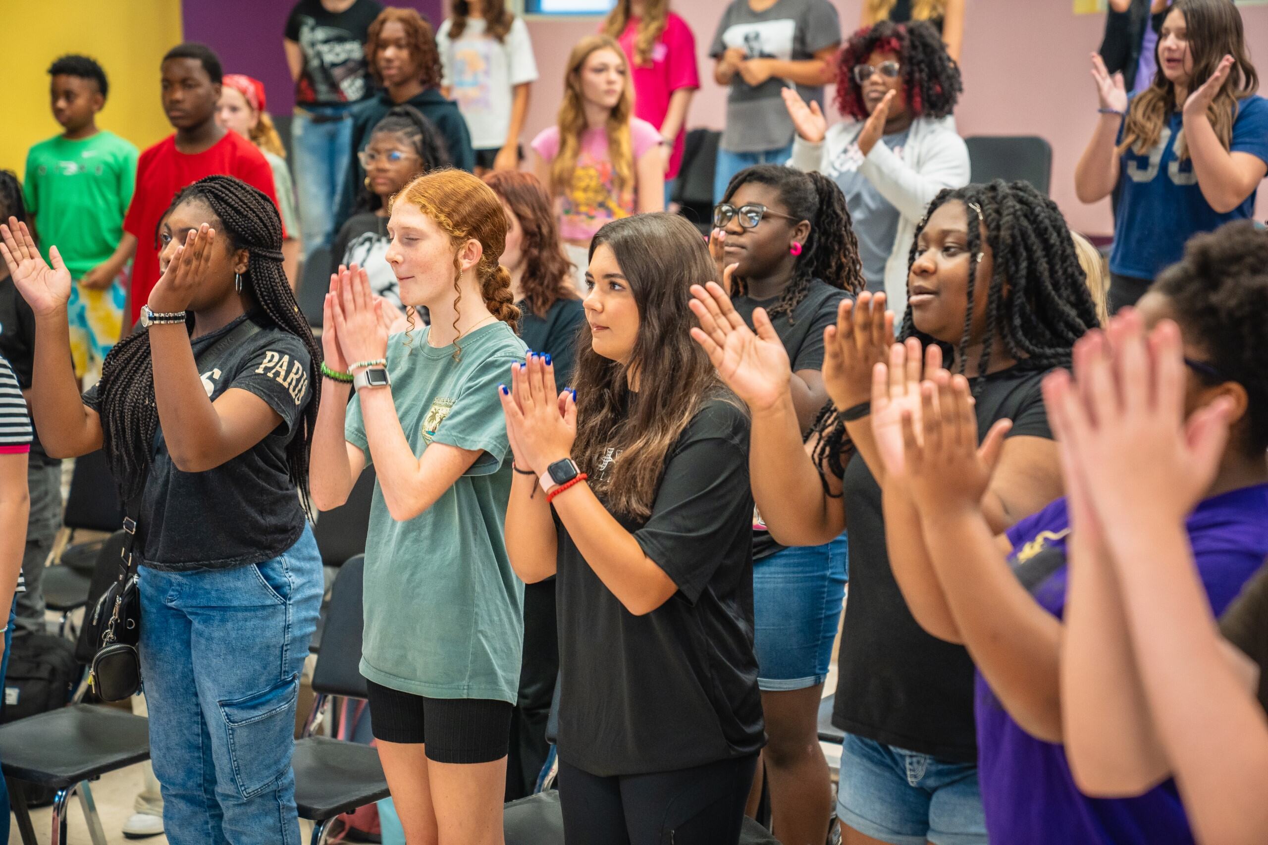 Students clapping 