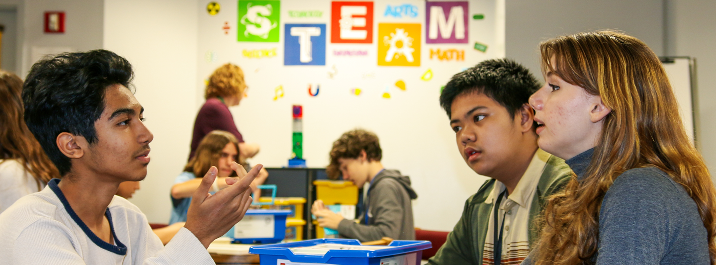 students having a discussion in a STEAM classroom