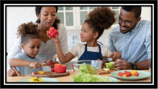 Family making food together