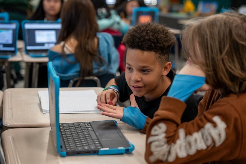 Students working on laptop