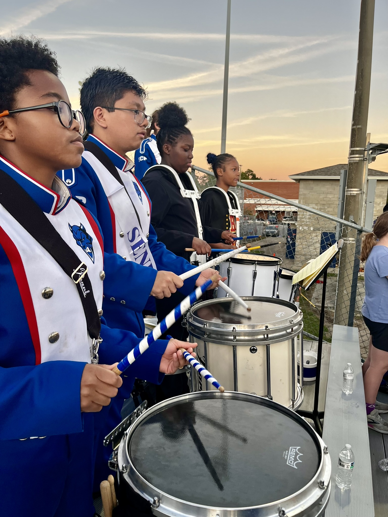YMWLA drumline students performing with the Stanton Drumline