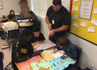 students working on an algebra activity