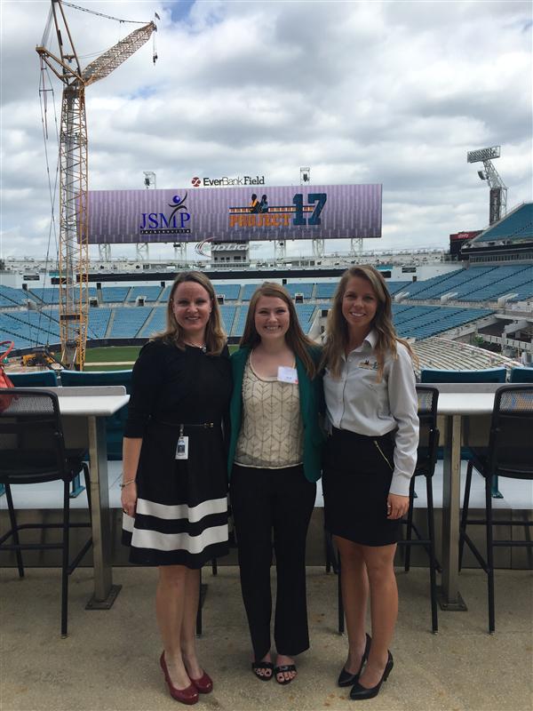 staff team looking and smiling to camera