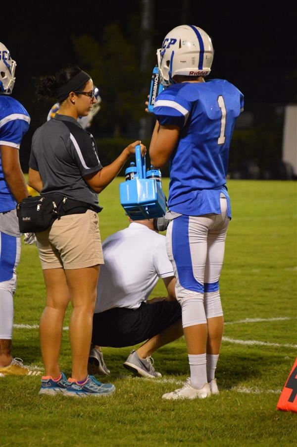 Medical staff assisting athlete