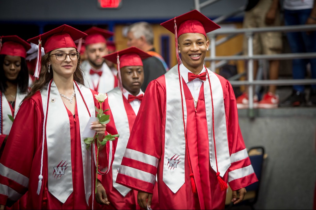 Students in caps and gowns for graduation