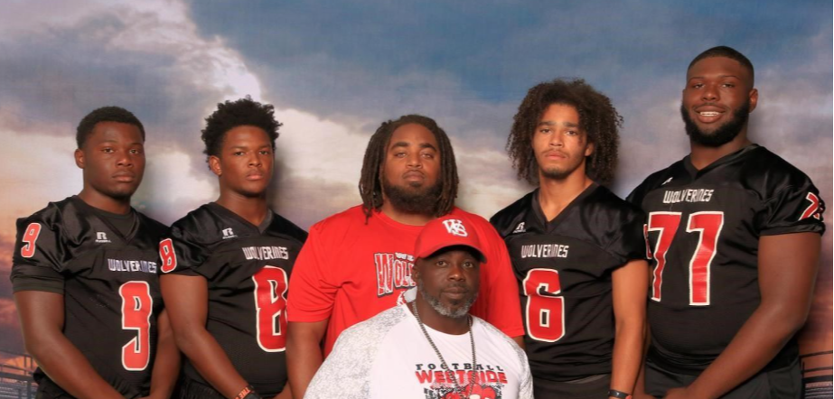 Students in football jerseys