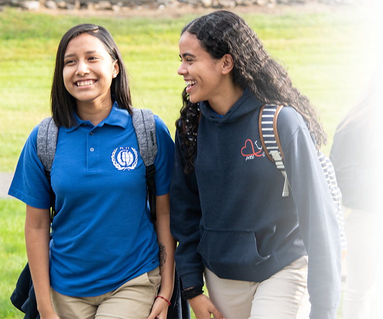 Students smiling at the camera