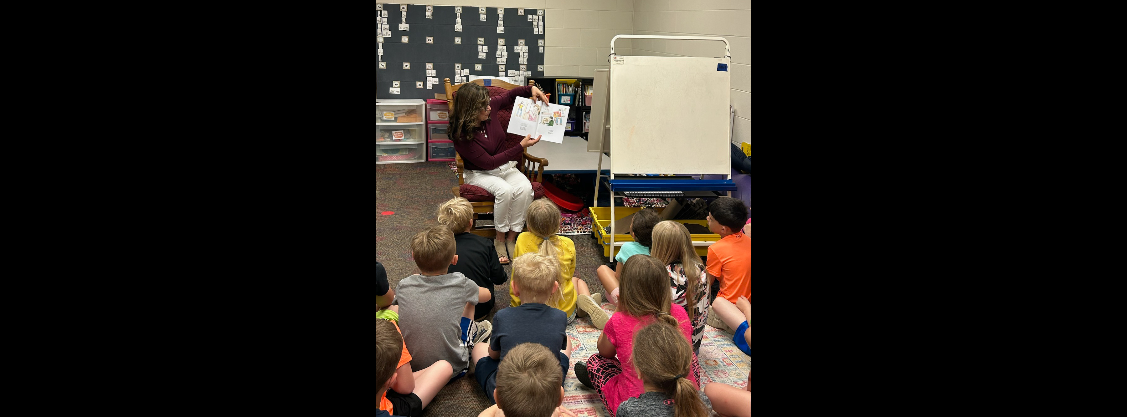 Pictured here is Teresa Schaefer reading to a class.
