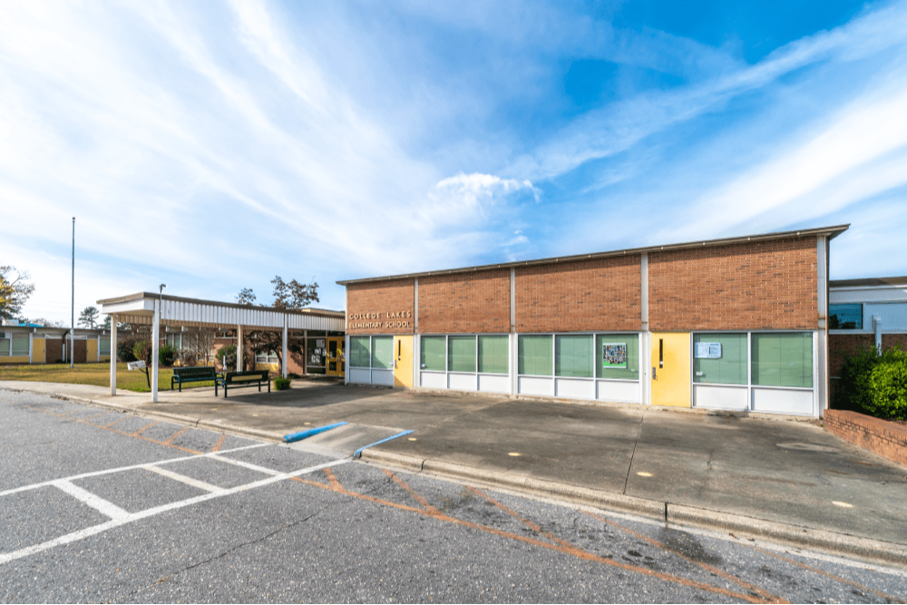 A photo of the front of college lakes elementary school