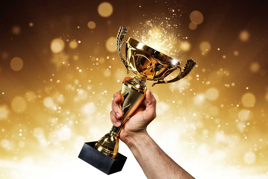person holding a trophy