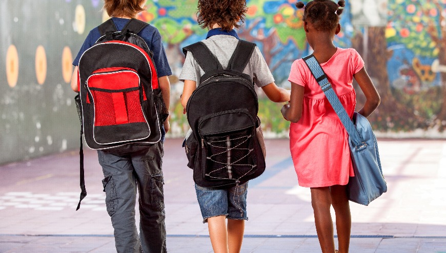 3 students with backpacks back to school