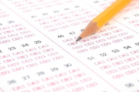 a pencil sitting on a test paper