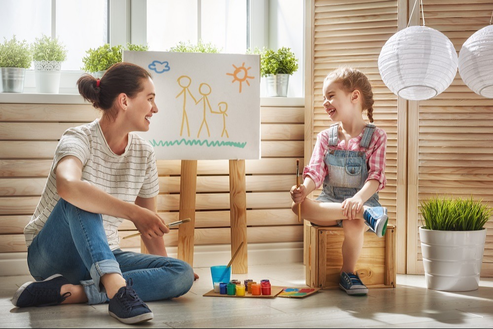 teacher and student laughing